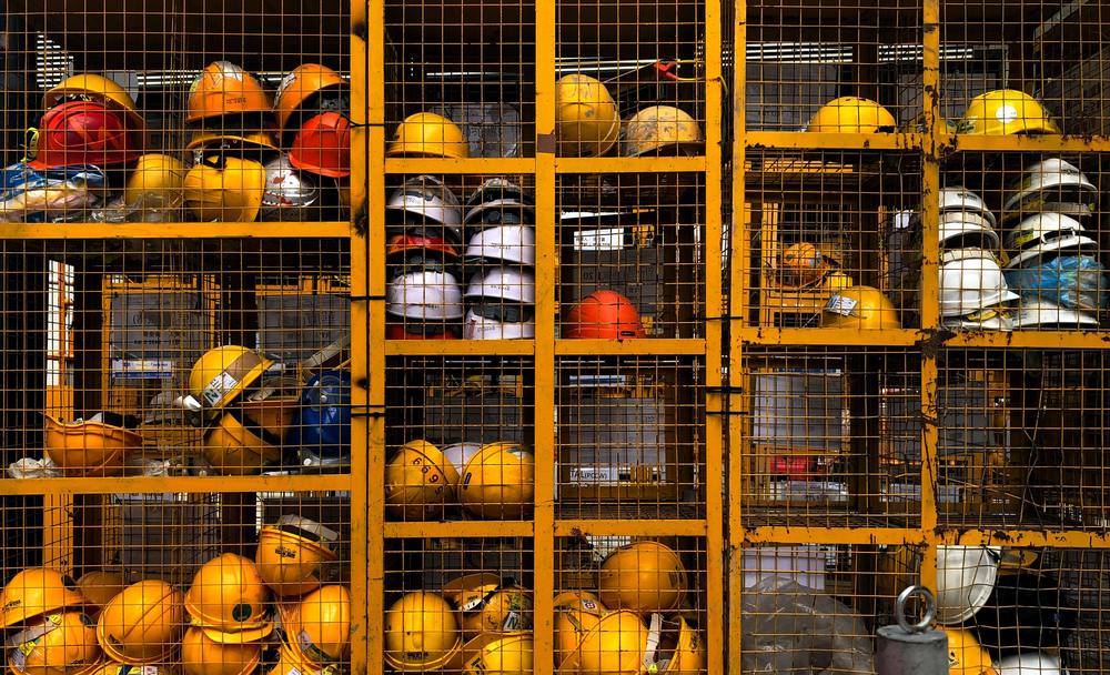 hard hats in cages